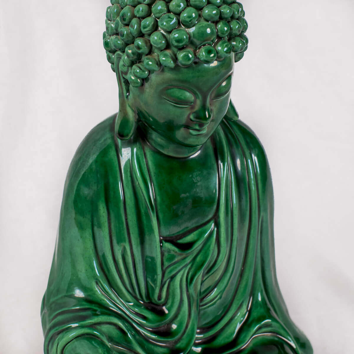 Buddha seduto verde